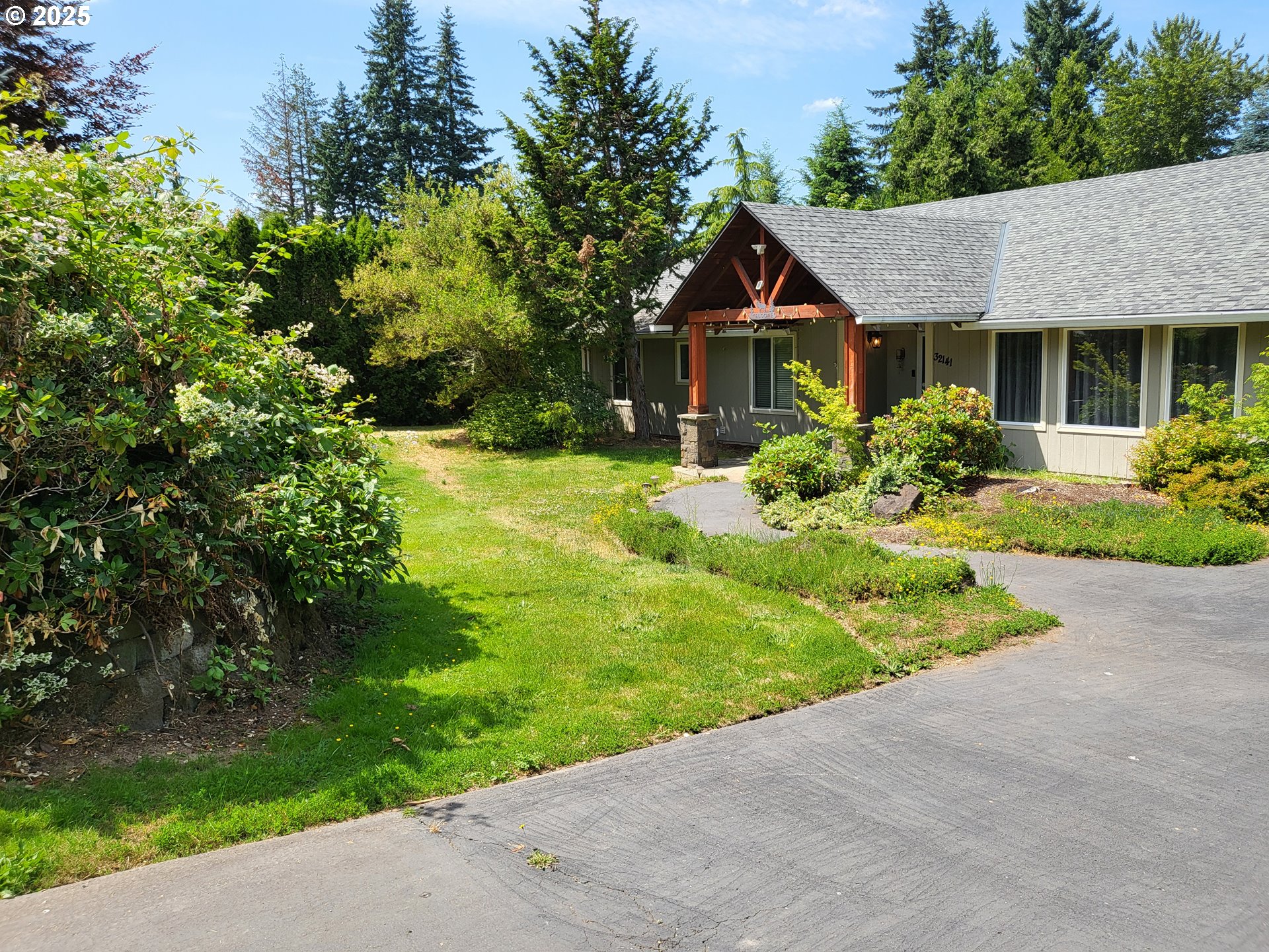 32141 Southeast Mally Road Gresham, OR 97080 - Photo 2 of 36 a front view of house with yard and green space