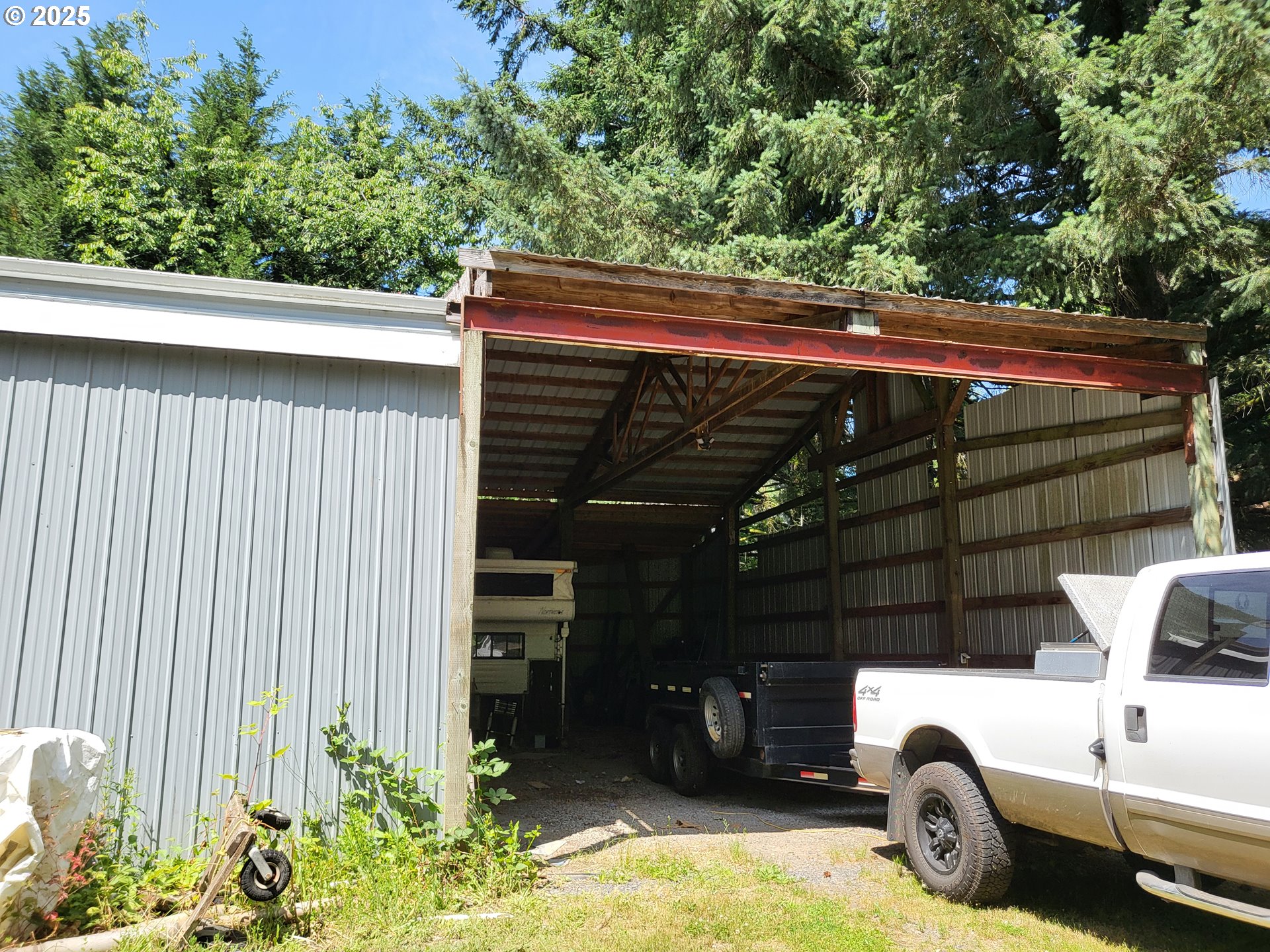 32141 Southeast Mally Road Gresham, OR 97080 - Photo 28 of 36 a view of patio with a table and chairs