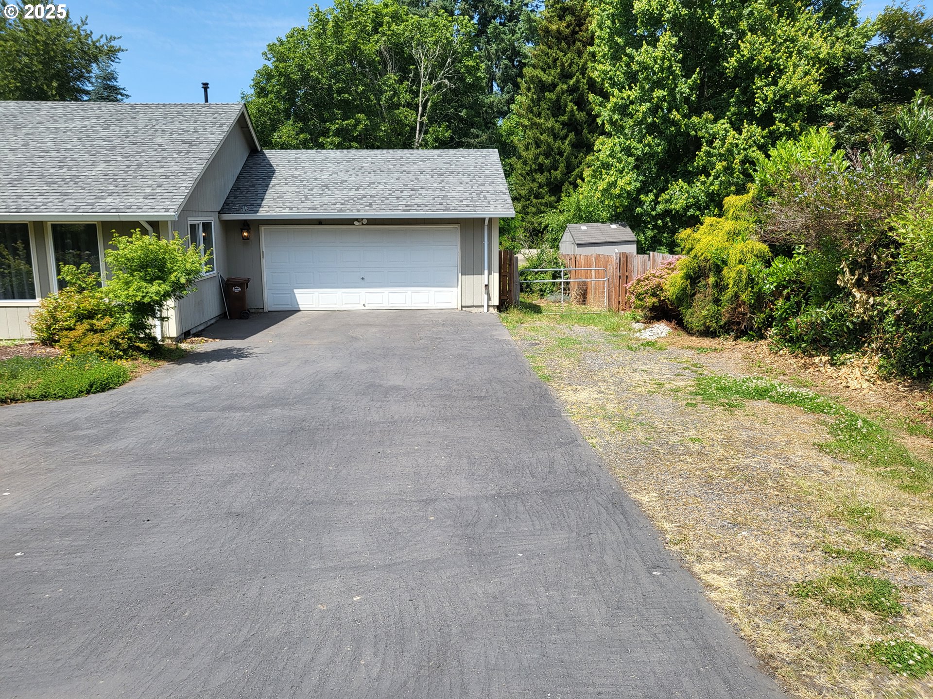 32141 Southeast Mally Road Gresham, OR 97080 - Photo 33 of 36 a front view of a house with a yard and garden