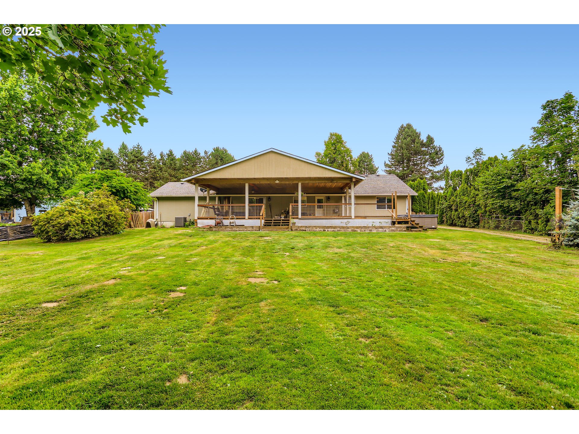 32141 Southeast Mally Road Gresham, OR 97080 - Photo 34 of 36 a white house with a big yard and large trees