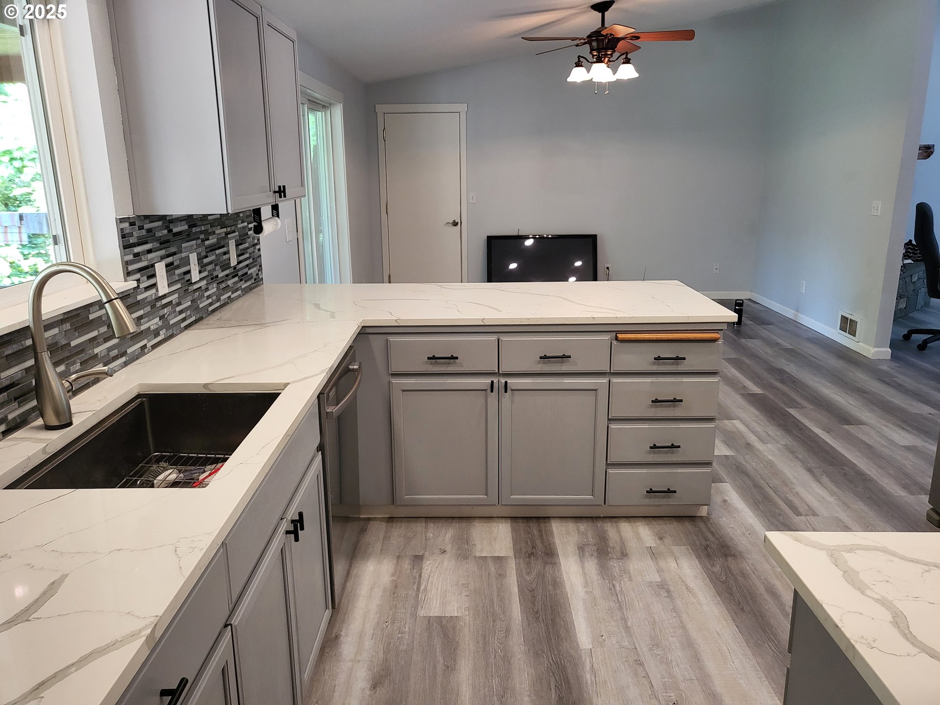 32141 Southeast Mally Road Gresham, OR 97080 - Photo 9 of 36 a kitchen with a sink stove and cabinets
