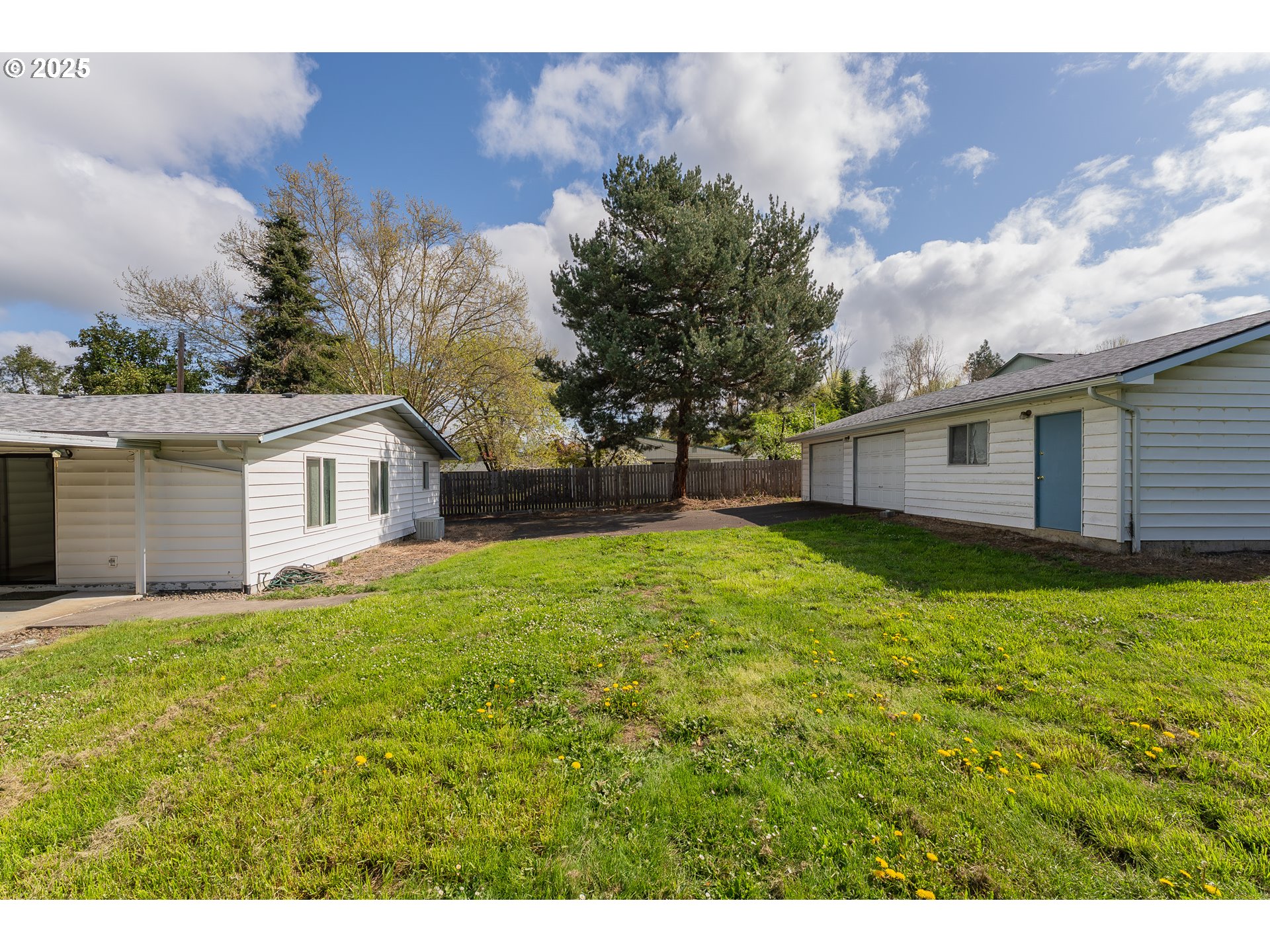 5121 Southwest Grange Road Roseburg, OR 97471 - Photo 36 of 42 a view of a backyard with a garden