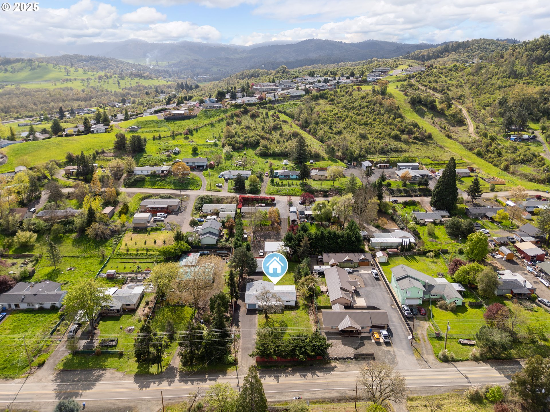 5121 Southwest Grange Road Roseburg, OR 97471 - Photo 4 of 42 an aerial view of multiple house