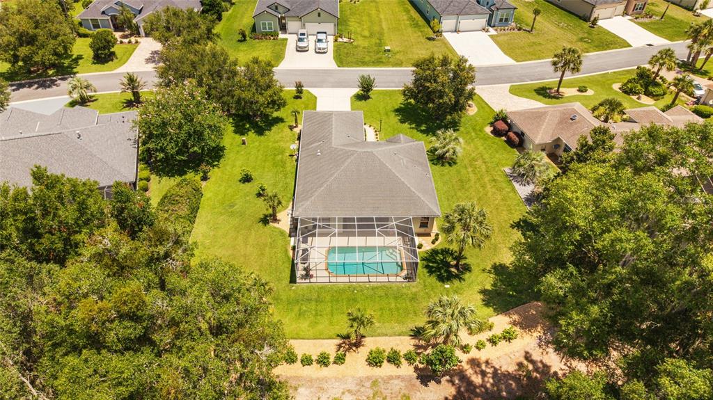 19639 Southwest 77th Loop Dunnellon, FL 34432 - Photo 7 of 59 an aerial view of residential house with swimming pool