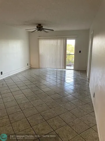 a view of a livingroom with a window