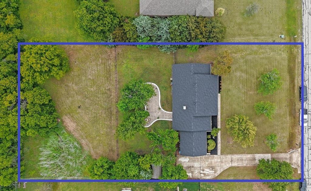 4501 Toler Road Rowlett, TX 75089 - Photo 33 of 35 an aerial view of a house with a yard and lake view