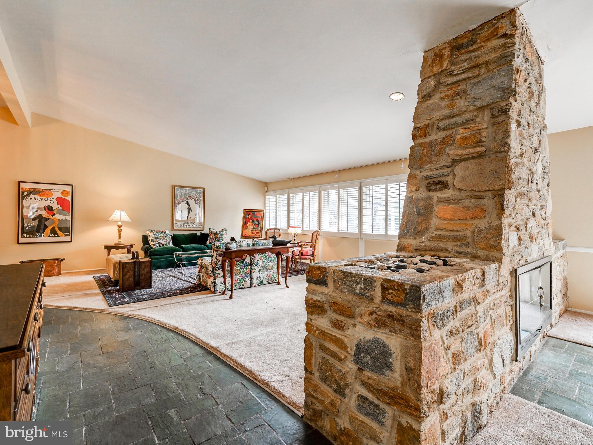 3411 Terrapin Road Pikesville, MD 21208 - Photo 13 of 35 LIVING ROOM WITH 2 WAY STONE FIREPLACE