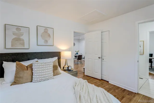 a bedroom with a bed and closet