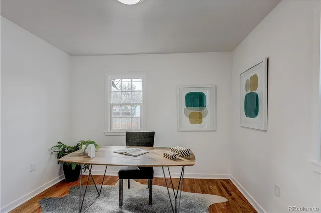a view of a workspace with furniture