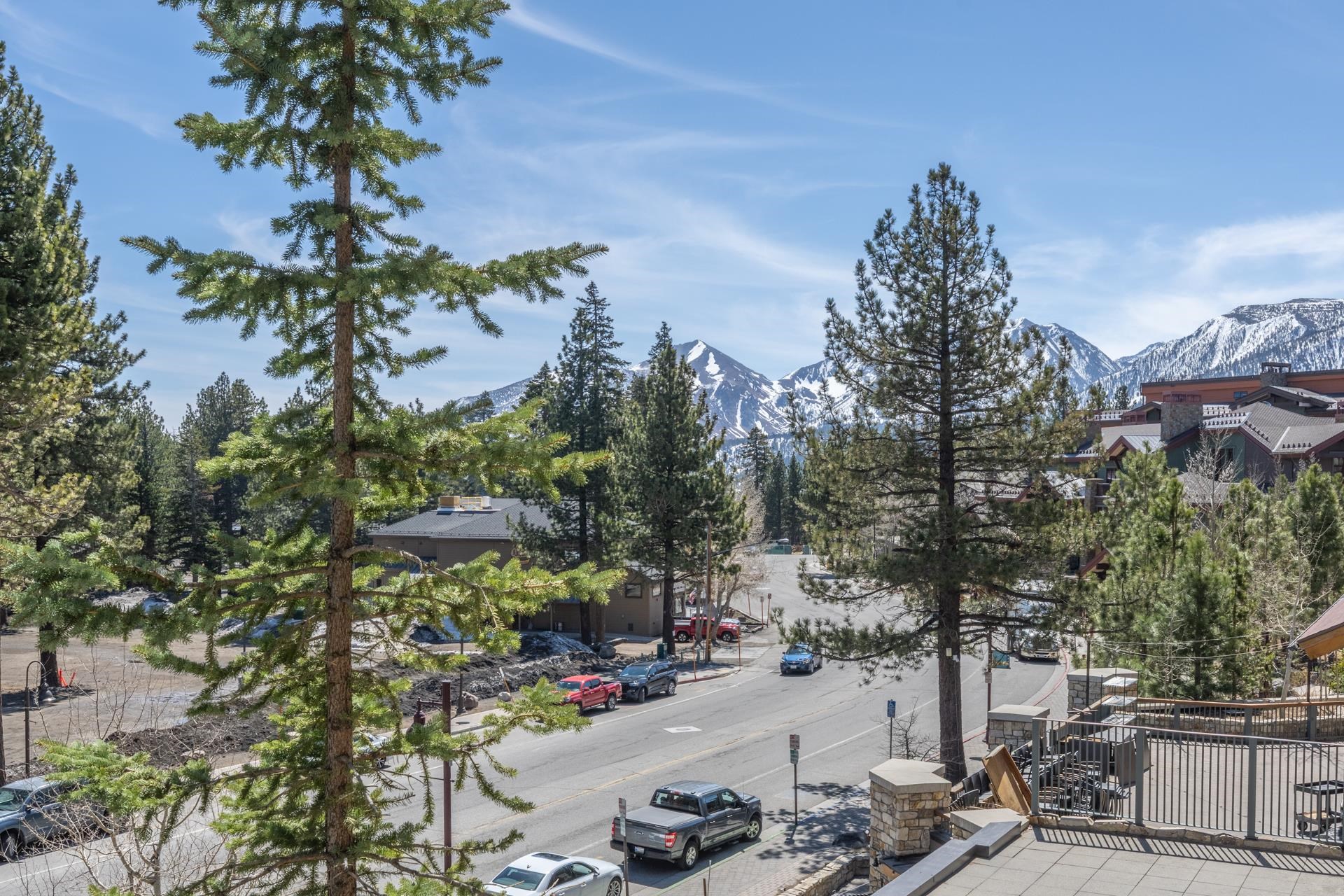 6201 Minaret Road, Unit 2221 Mammoth Lakes, CA 93546 - Photo 25 of 32 Mountain scenery with snow-capped peaks and surrounding evergreen trees