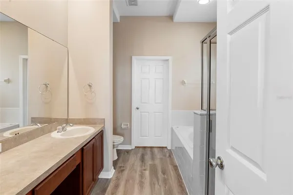a bathroom with a sink double vanity and a mirror