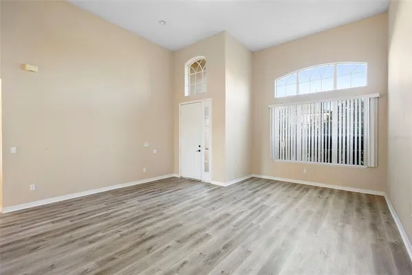 a kitchen with stainless steel appliances granite countertop a stove top oven a sink dishwasher and a refrigerator