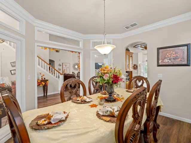 a view of a dining room with furniture