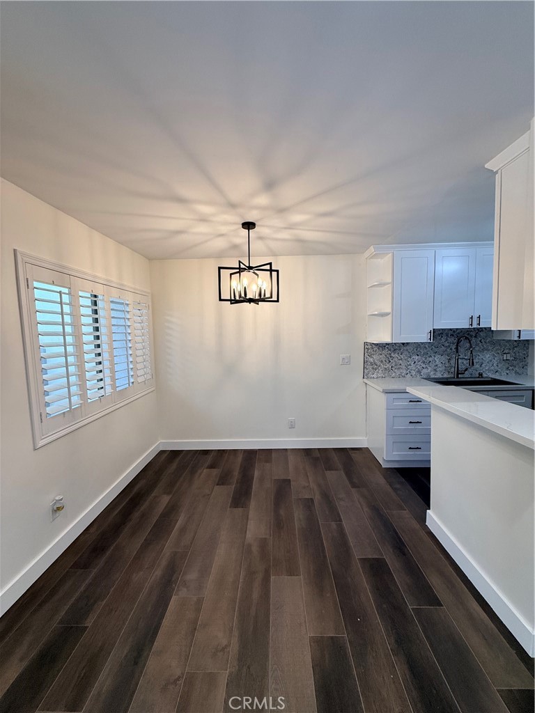 1522 Centinela Avenue, Unit 101 Los Angeles, CA 90025 - Photo 5 of 22 a view of kitchen and wooden floor
