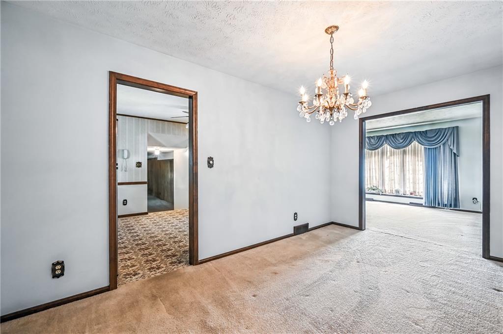 1471 George Street Hermitage, PA 16148 - Photo 24 of 49 a view of a big room with windows and chandelier