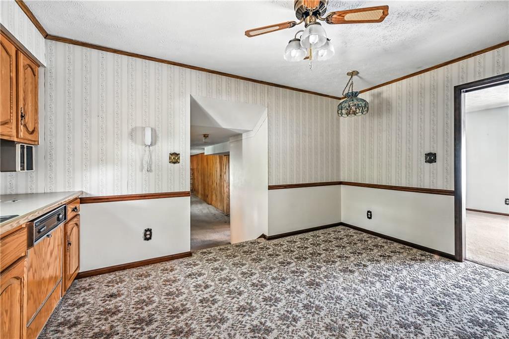 1471 George Street Hermitage, PA 16148 - Photo 27 of 49 a view of a refrigerator in kitchen and wooden floor
