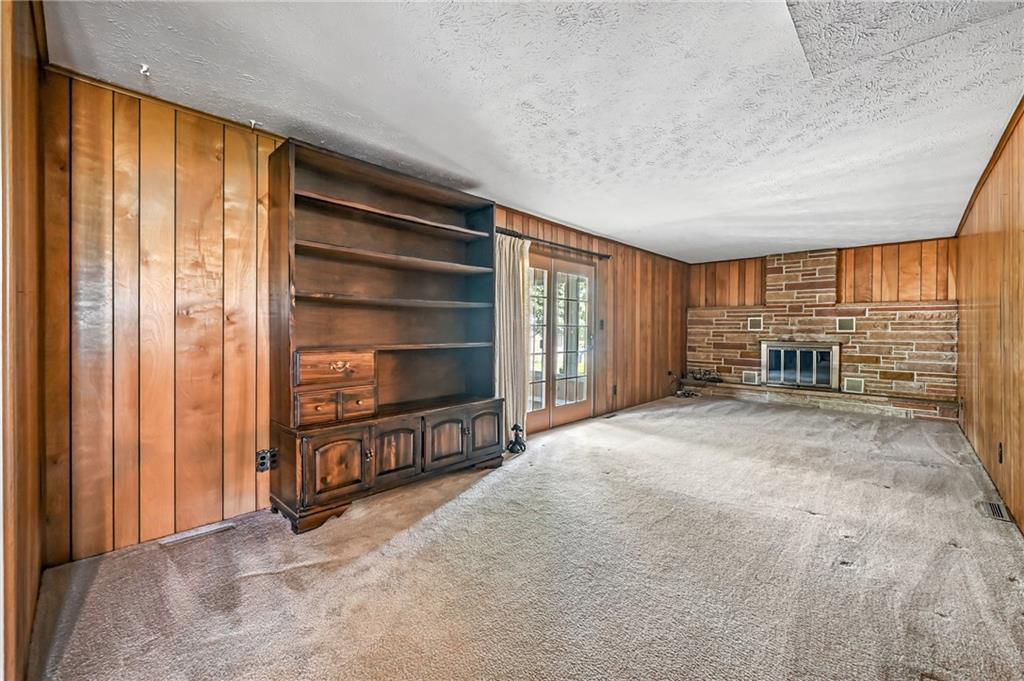 1471 George Street Hermitage, PA 16148 - Photo 29 of 49 an empty room with a fireplace and window
