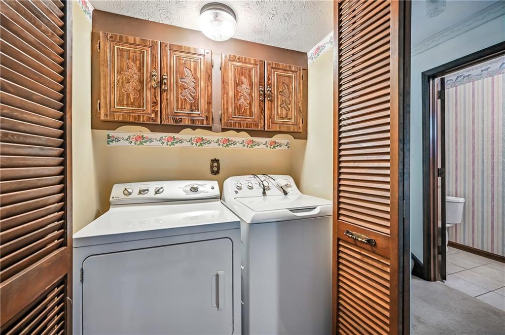 1471 George Street Hermitage, PA 16148 - Photo 34 of 49 a utility room with dryer and washer