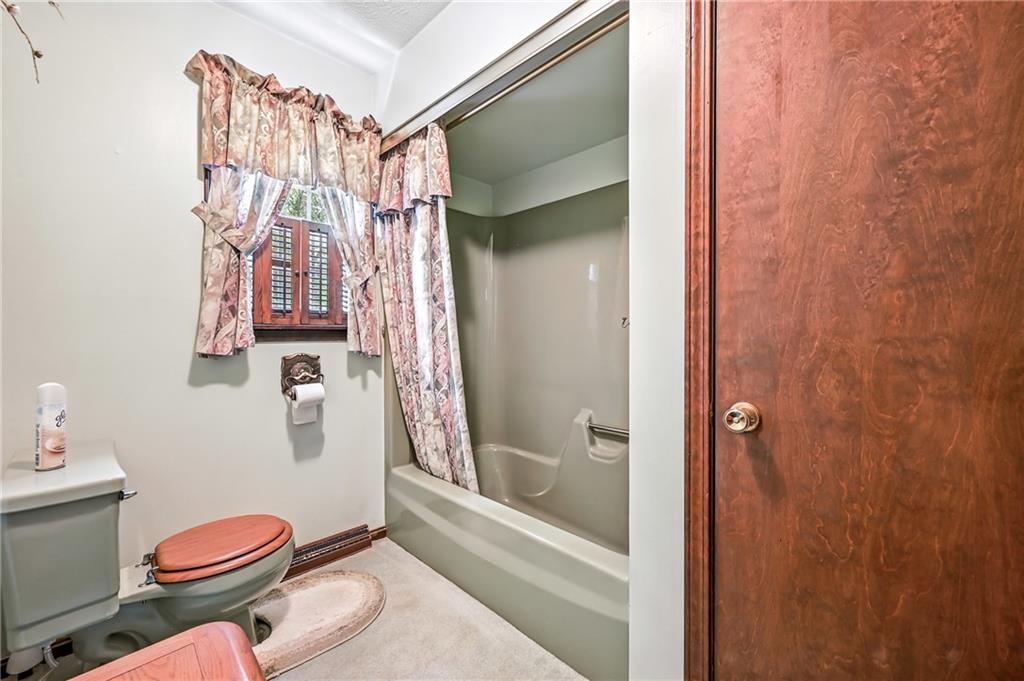 1471 George Street Hermitage, PA 16148 - Photo 40 of 49 a bathroom with a toilet tub and shower