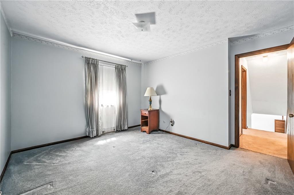 1471 George Street Hermitage, PA 16148 - Photo 41 of 49 an empty room with a door