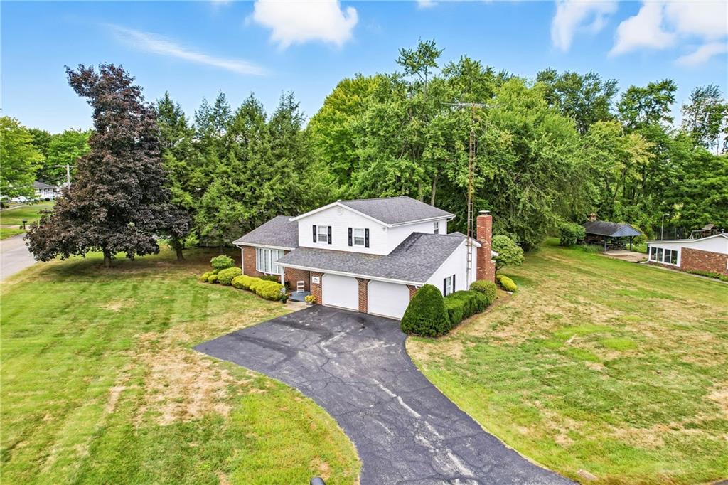 1471 George Street Hermitage, PA 16148 - Photo 5 of 49 swimming pool view with a garden