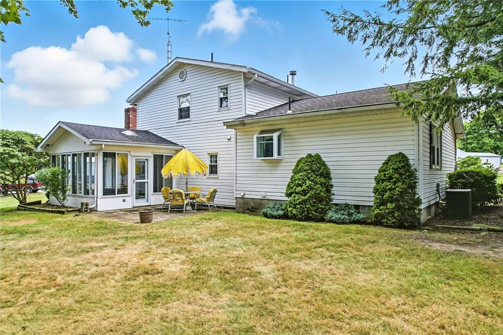 1471 George Street Hermitage, PA 16148 - Photo 9 of 49 a view of a house with swimming pool and a yard