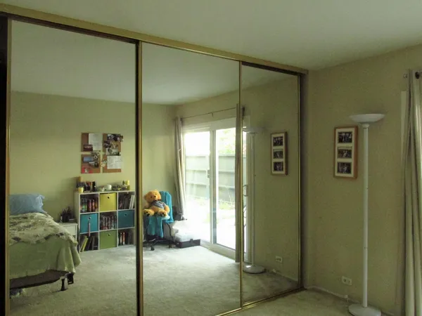 a living room with furniture and a shower