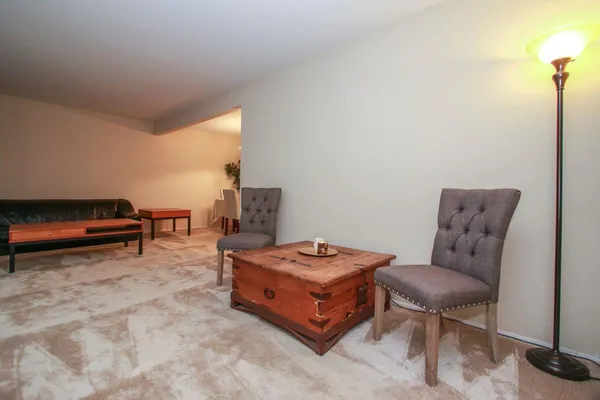 a living room with furniture and a couch