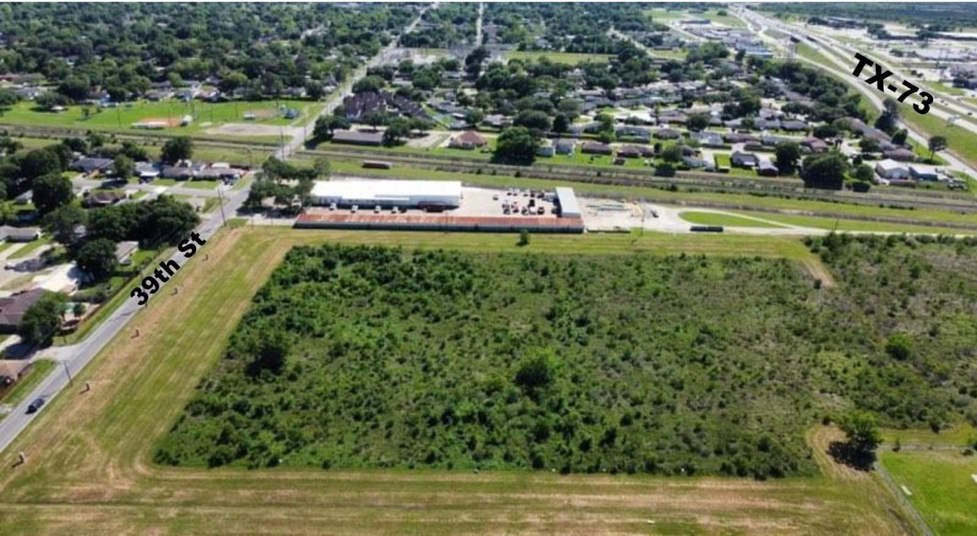 0 39th Street Port Arthur, TX 77642 - Photo 2 of 17 a view of a swimming pool with lawn chairs and plants