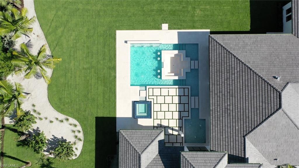 6435 Sable Ridge Lane Naples, FL 34109 - Photo 5 of 8 an aerial view of a house