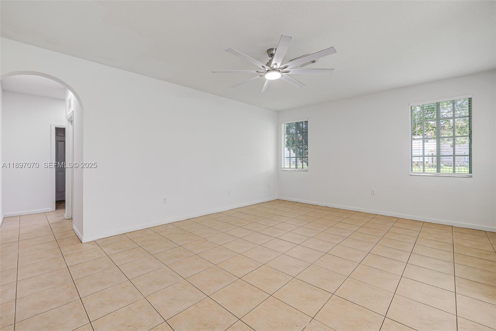 27381 Southwest 139th Place Homestead, FL 33032 - Photo 15 of 70 a view of an empty room and window