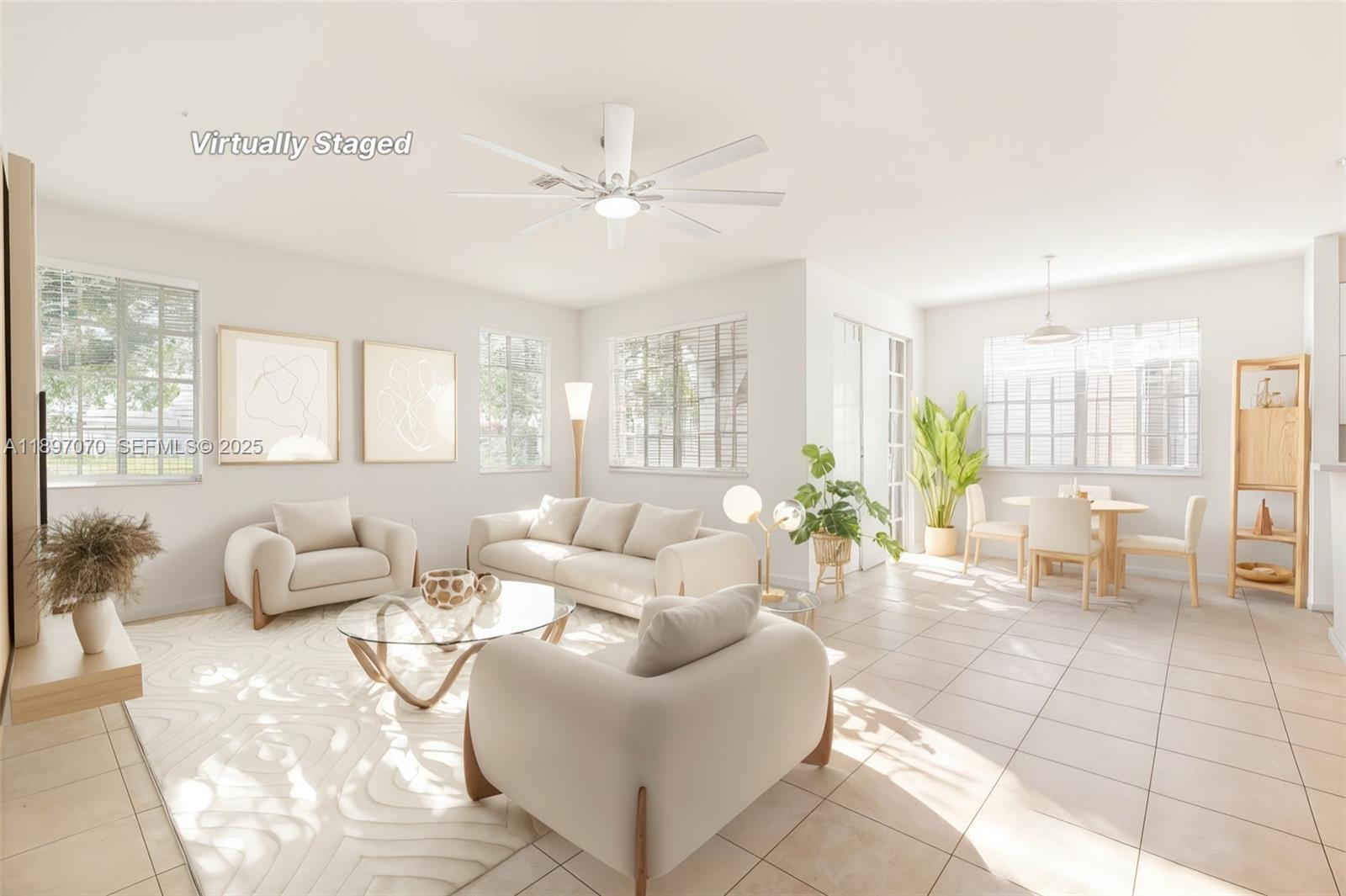 27381 Southwest 139th Place Homestead, FL 33032 - Photo 18 of 70 a living room with furniture and a large window