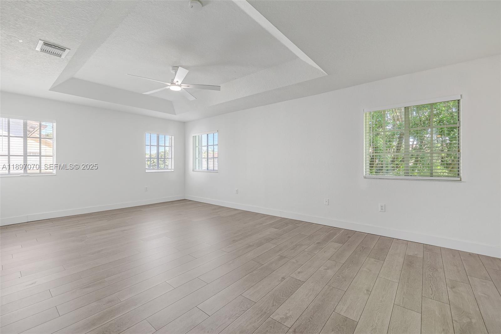 27381 Southwest 139th Place Homestead, FL 33032 - Photo 27 of 70 wooden floor in an empty room with a window