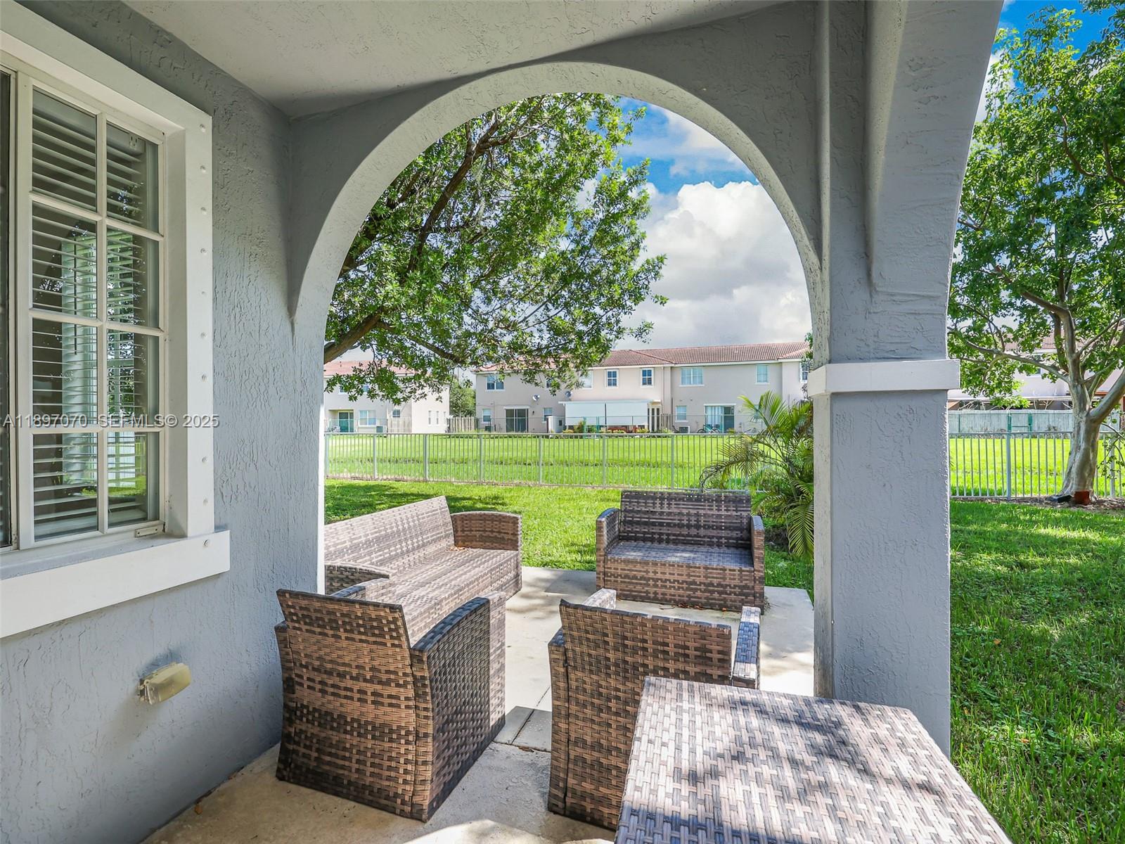 27381 Southwest 139th Place Homestead, FL 33032 - Photo 49 of 70 a view of a two chairs in the garden