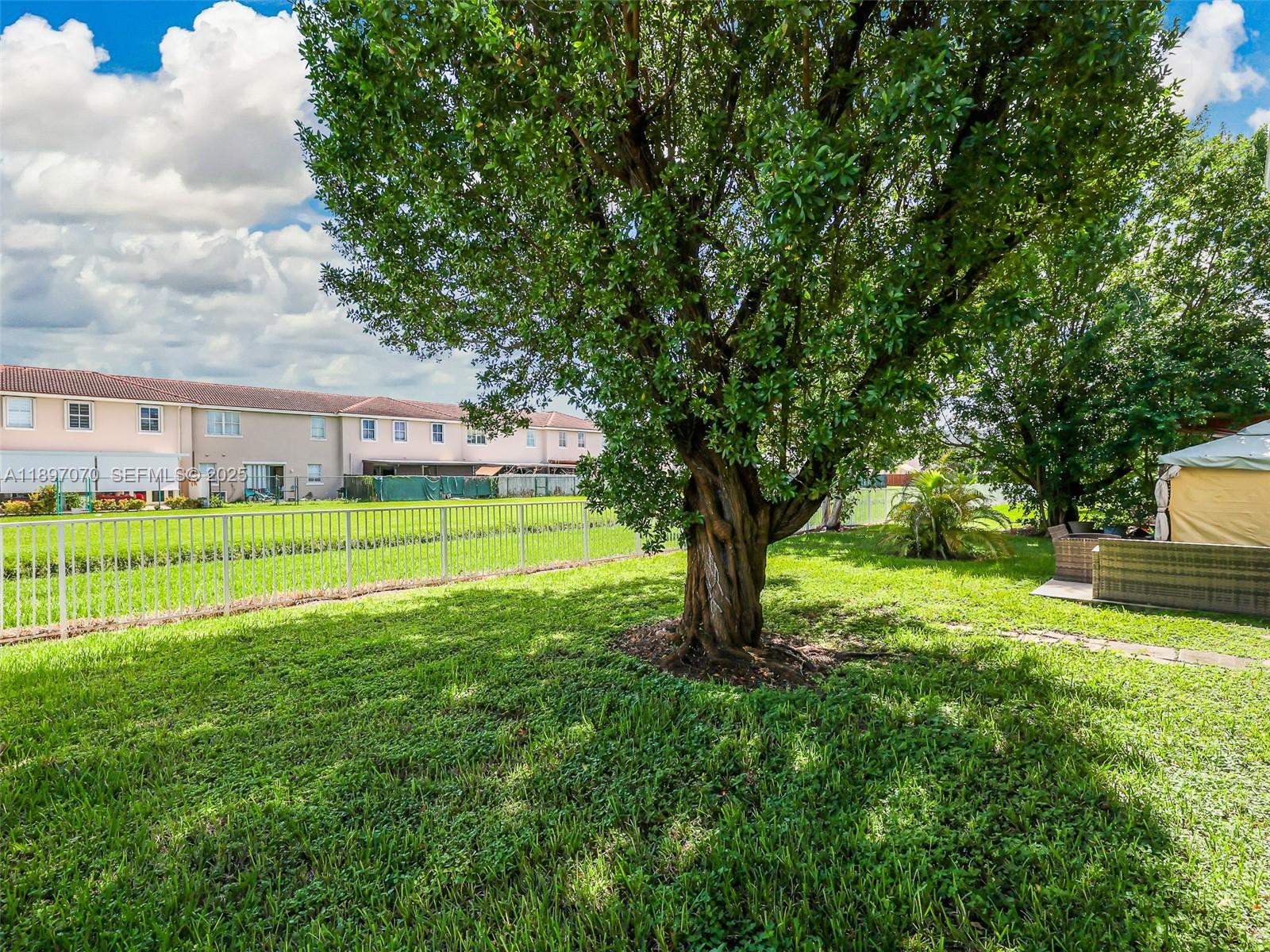 27381 Southwest 139th Place Homestead, FL 33032 - Photo 55 of 70 a view of a house with a big yard