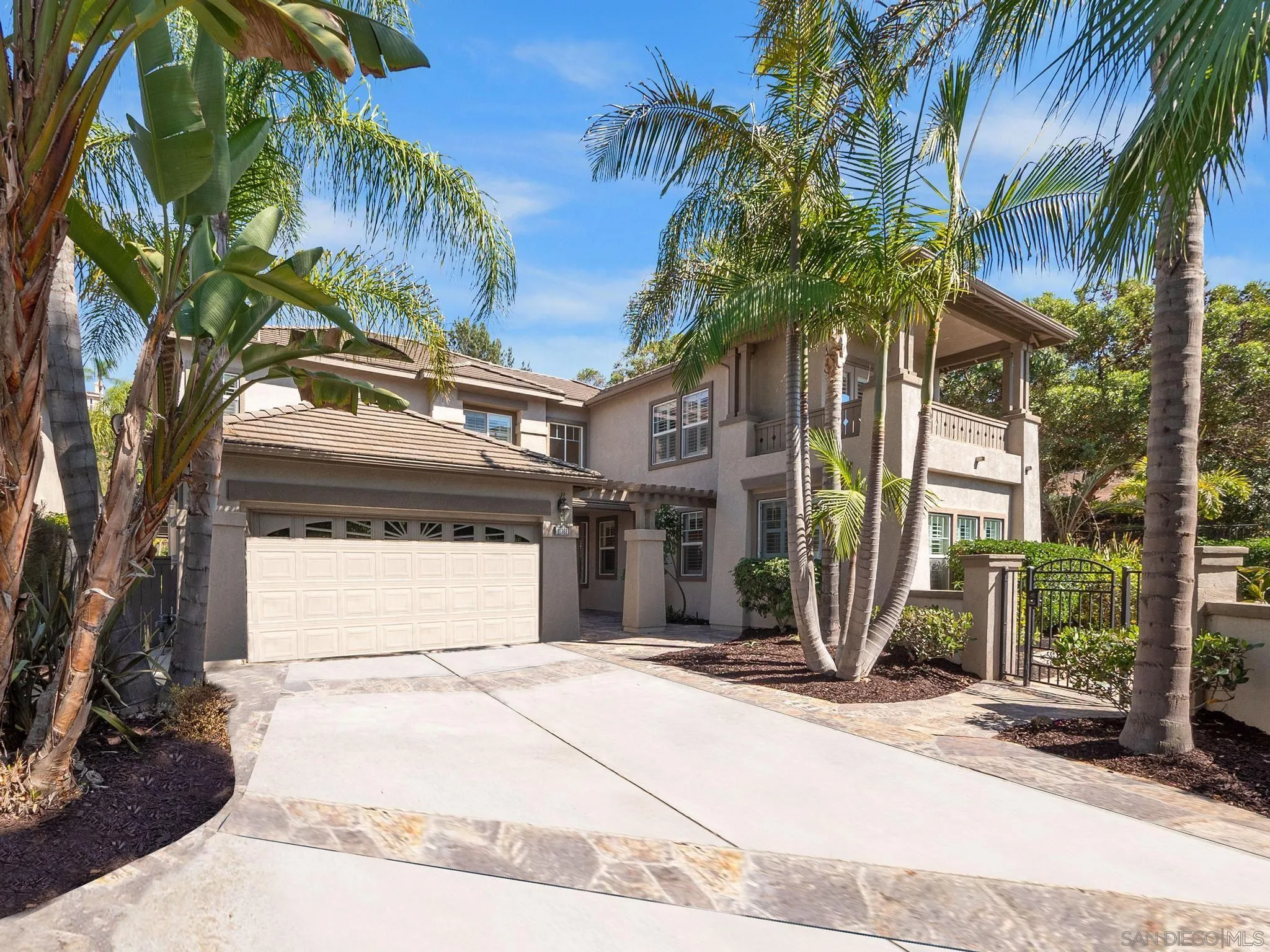 11361 Raedene Way San Diego, CA 92131 - Photo 1 of 57 a front view of a house with a yard