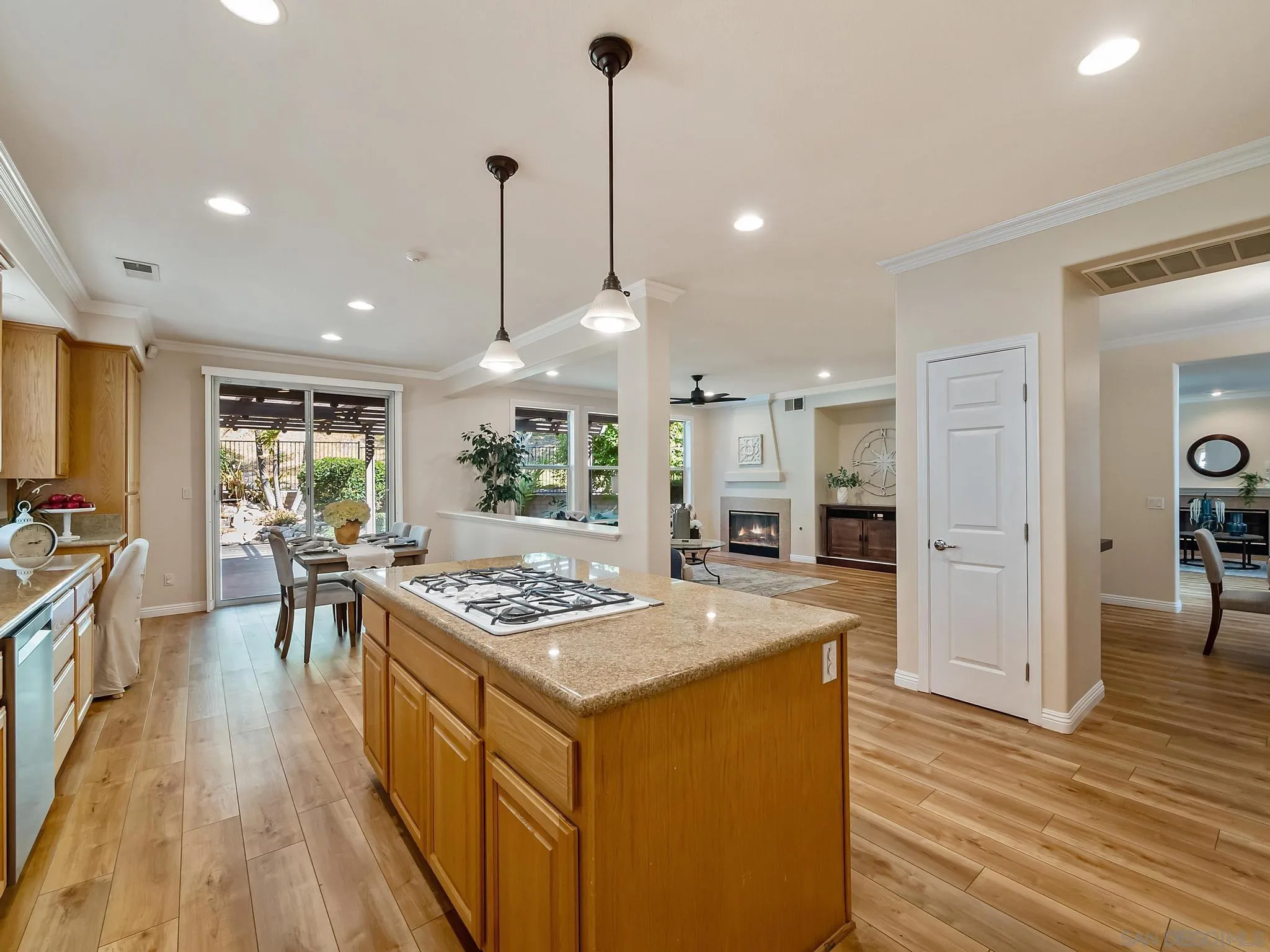 11361 Raedene Way San Diego, CA 92131 - Photo 12 of 57 a kitchen with stove and refrigerator