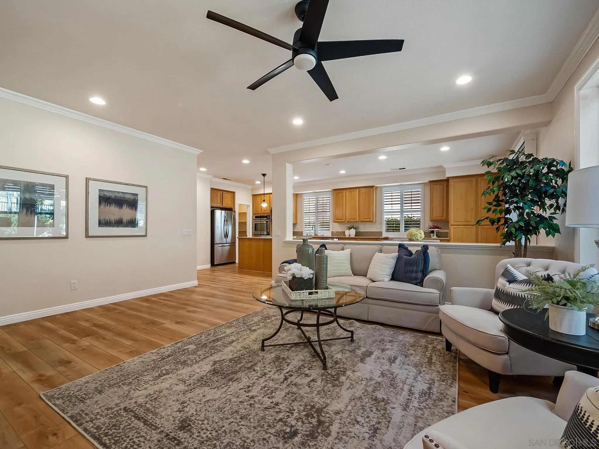 11361 Raedene Way San Diego, CA 92131 - Photo 17 of 57 a living room with furniture