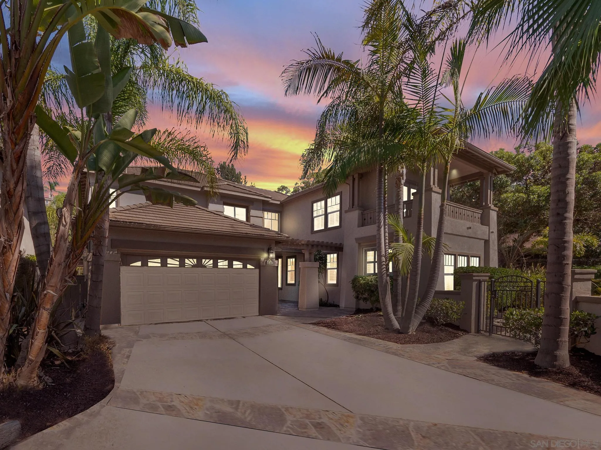 11361 Raedene Way San Diego, CA 92131 - Photo 2 of 57 a front view of a building with palm trees
