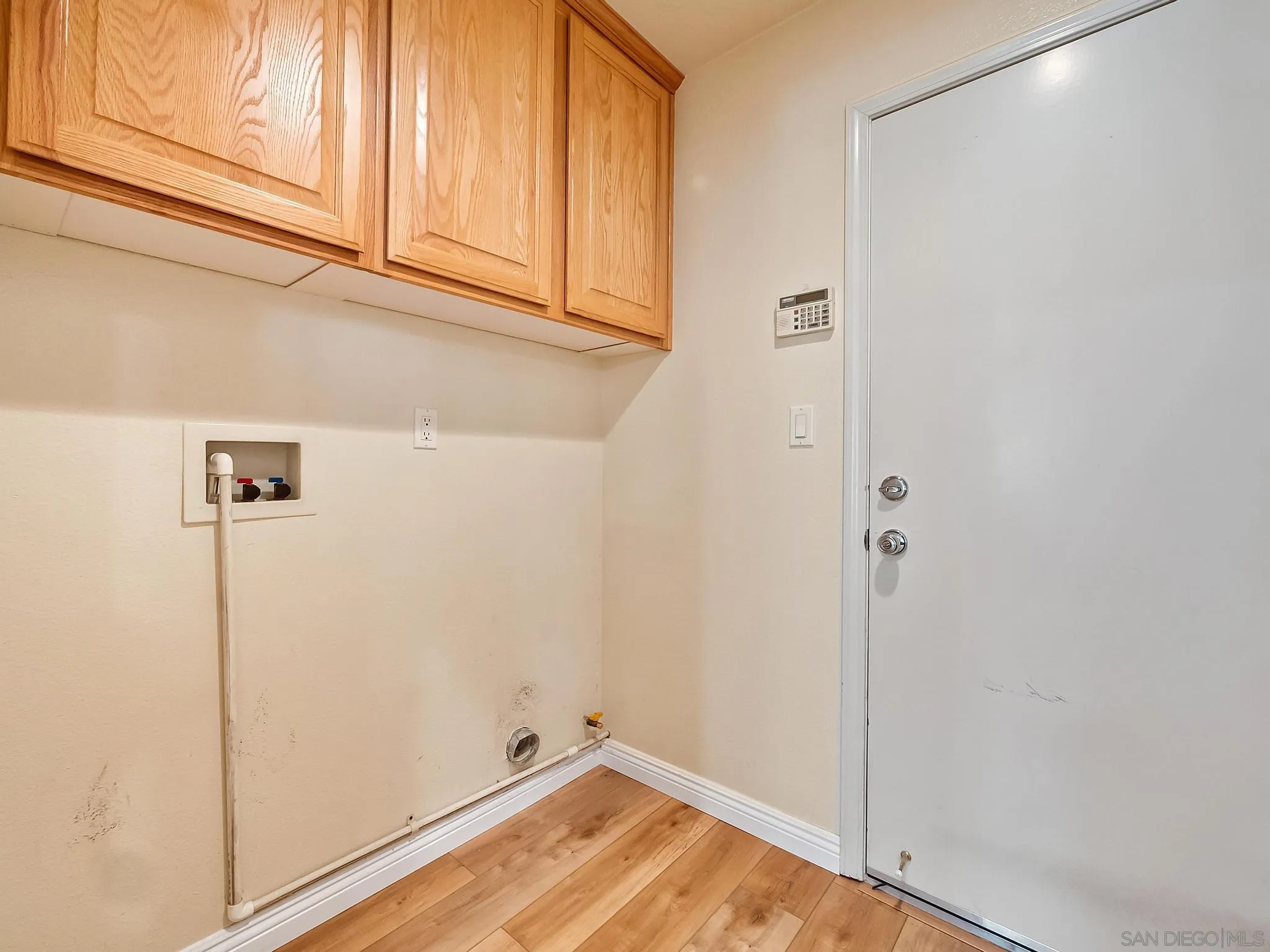 11361 Raedene Way San Diego, CA 92131 - Photo 23 of 57 a view of a storage & utility room with a sink