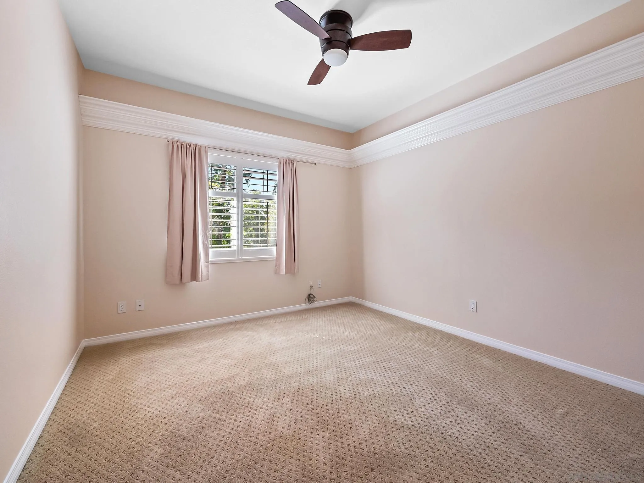 11361 Raedene Way San Diego, CA 92131 - Photo 26 of 57 an empty room with a window