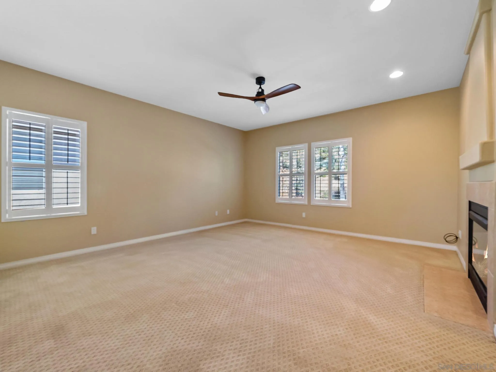 11361 Raedene Way San Diego, CA 92131 - Photo 30 of 57 a view of an empty room with a window