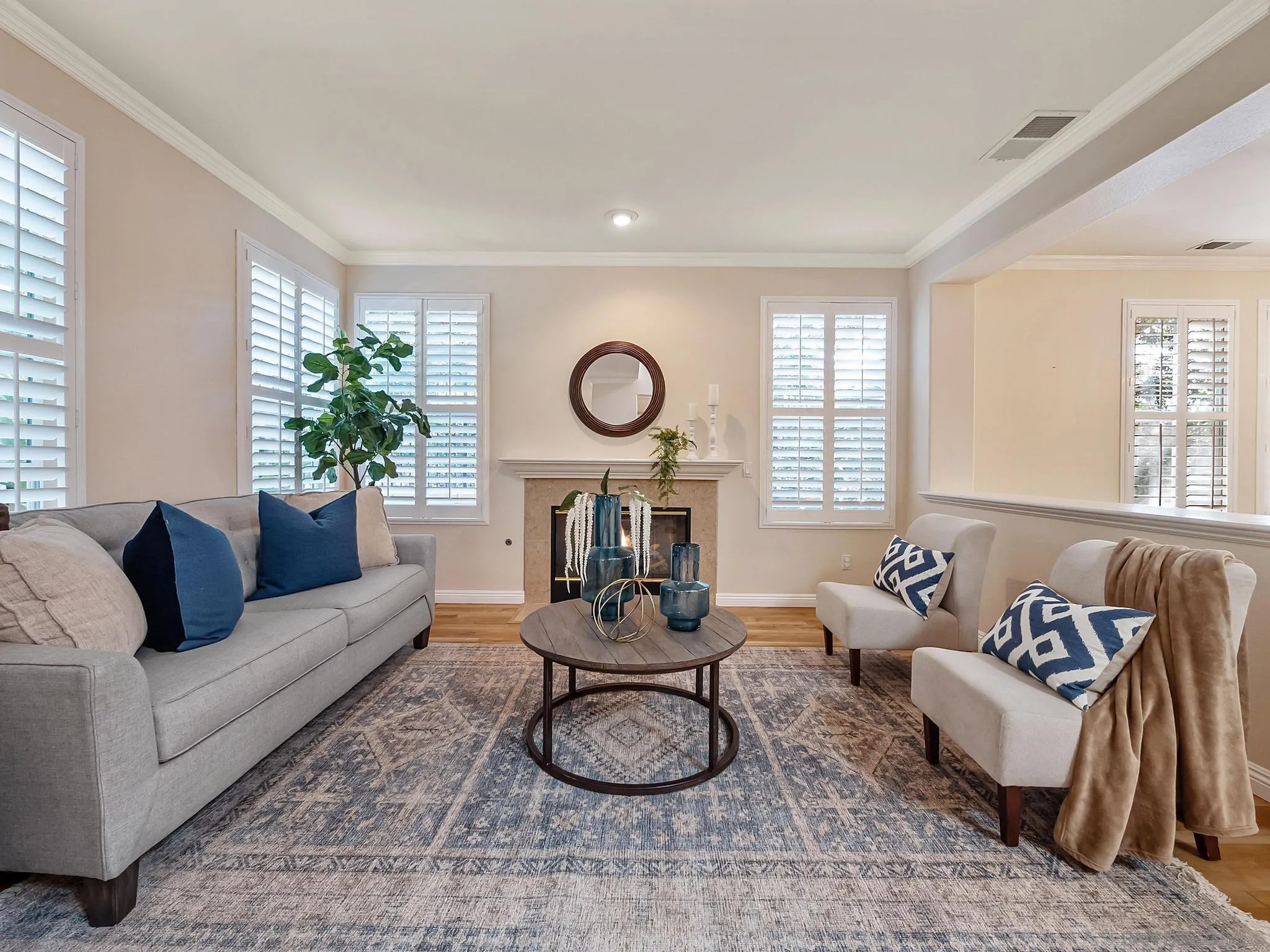 11361 Raedene Way San Diego, CA 92131 - Photo 3 of 57 a living room with furniture a window and a potted plant