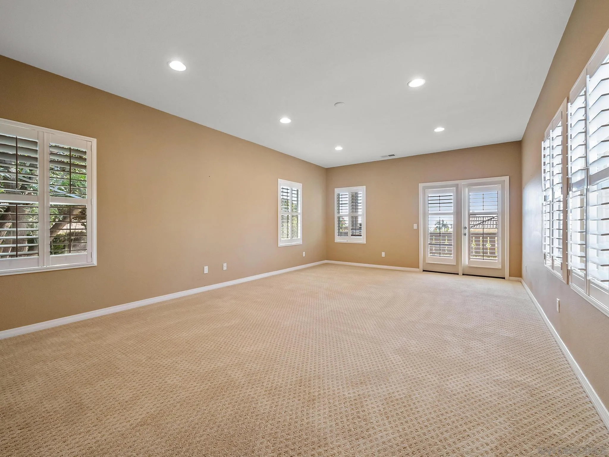 11361 Raedene Way San Diego, CA 92131 - Photo 39 of 57 a view of an empty room with a window