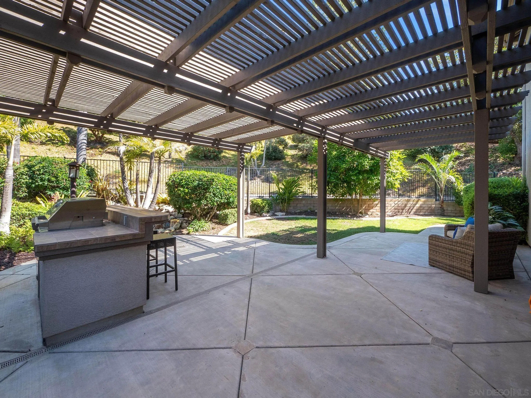 11361 Raedene Way San Diego, CA 92131 - Photo 42 of 57 a view of a swimming pool with a patio