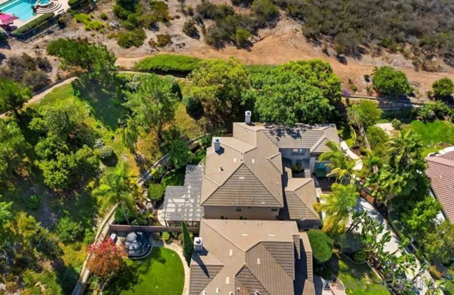 11361 Raedene Way San Diego, CA 92131 - Photo 52 of 57 an aerial view of a house with a yard and garden