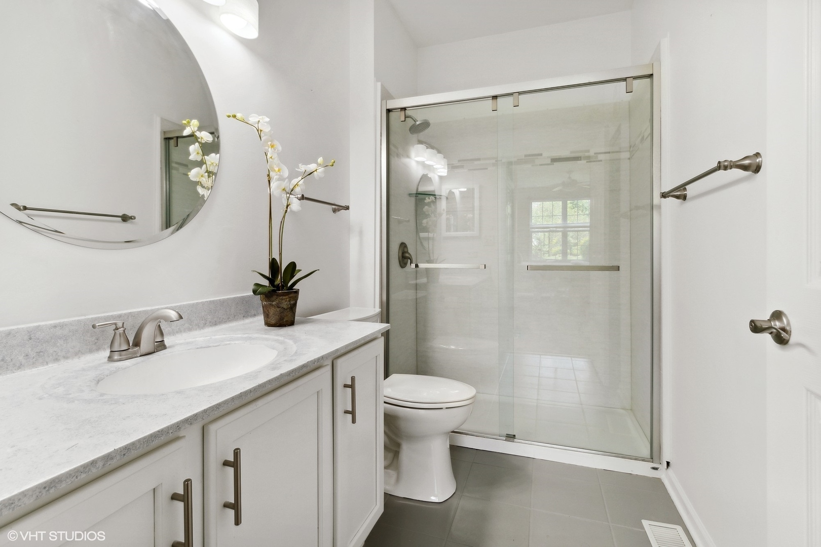 2480 Golf Ridge Circle, Unit 2480 Naperville, IL 60563 - Photo 10 of 15 a bathroom with a sink a toilet and shower
