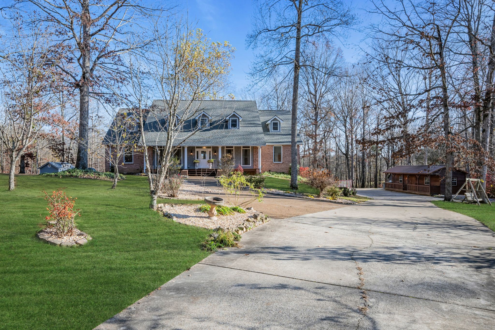 1265 Johnny Hall Road Burns, TN 37029 - Photo 2 of 89 Beautifully landscaped for a serene feel!