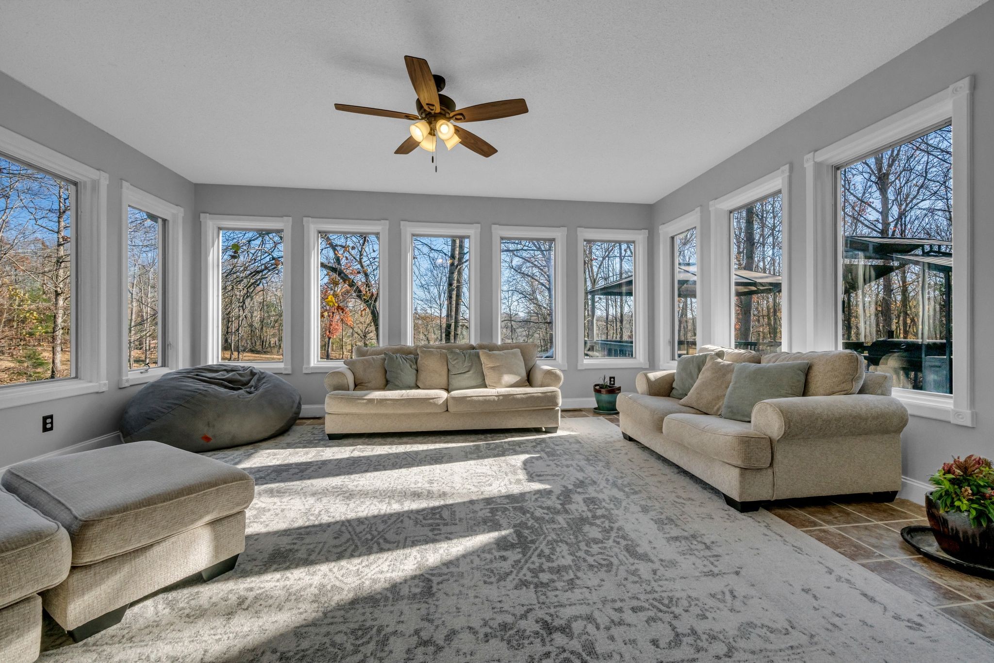 1265 Johnny Hall Road Burns, TN 37029 - Photo 28 of 89 Relax and enjoy the views in this cozy sunroom with casement windows.