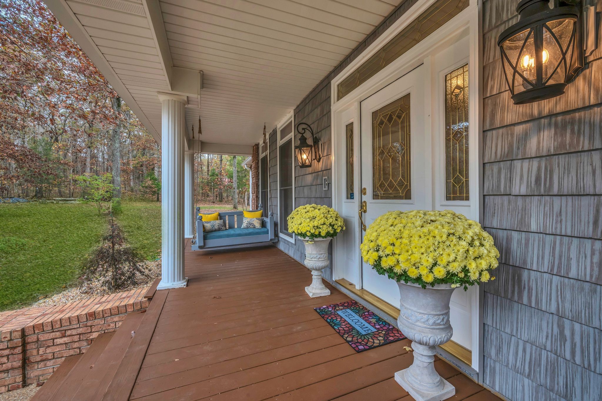 1265 Johnny Hall Road Burns, TN 37029 - Photo 7 of 89 Enjoy the quiet and beauty from the front porch swing!